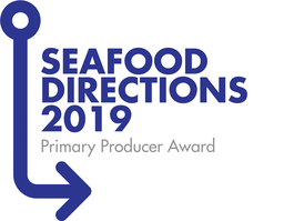Logo for Seafood Directions 2019 Primary Producer Award. To the left of the writing, there is a blue arrow, which extends from the top left hand corner, down underneath the writing.