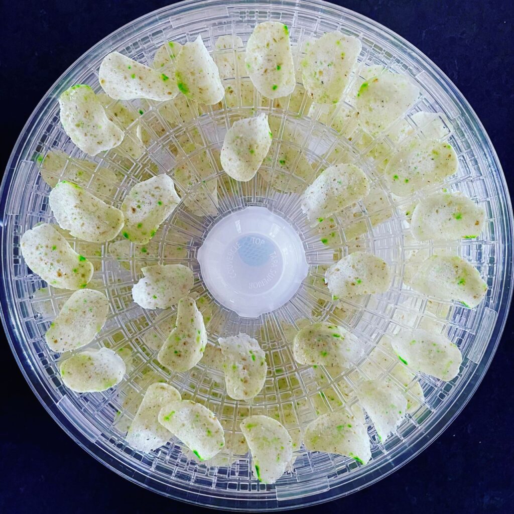 Yumbah Abalone Chilli and Lime Crackers displayed in a circle on a dehydrator.